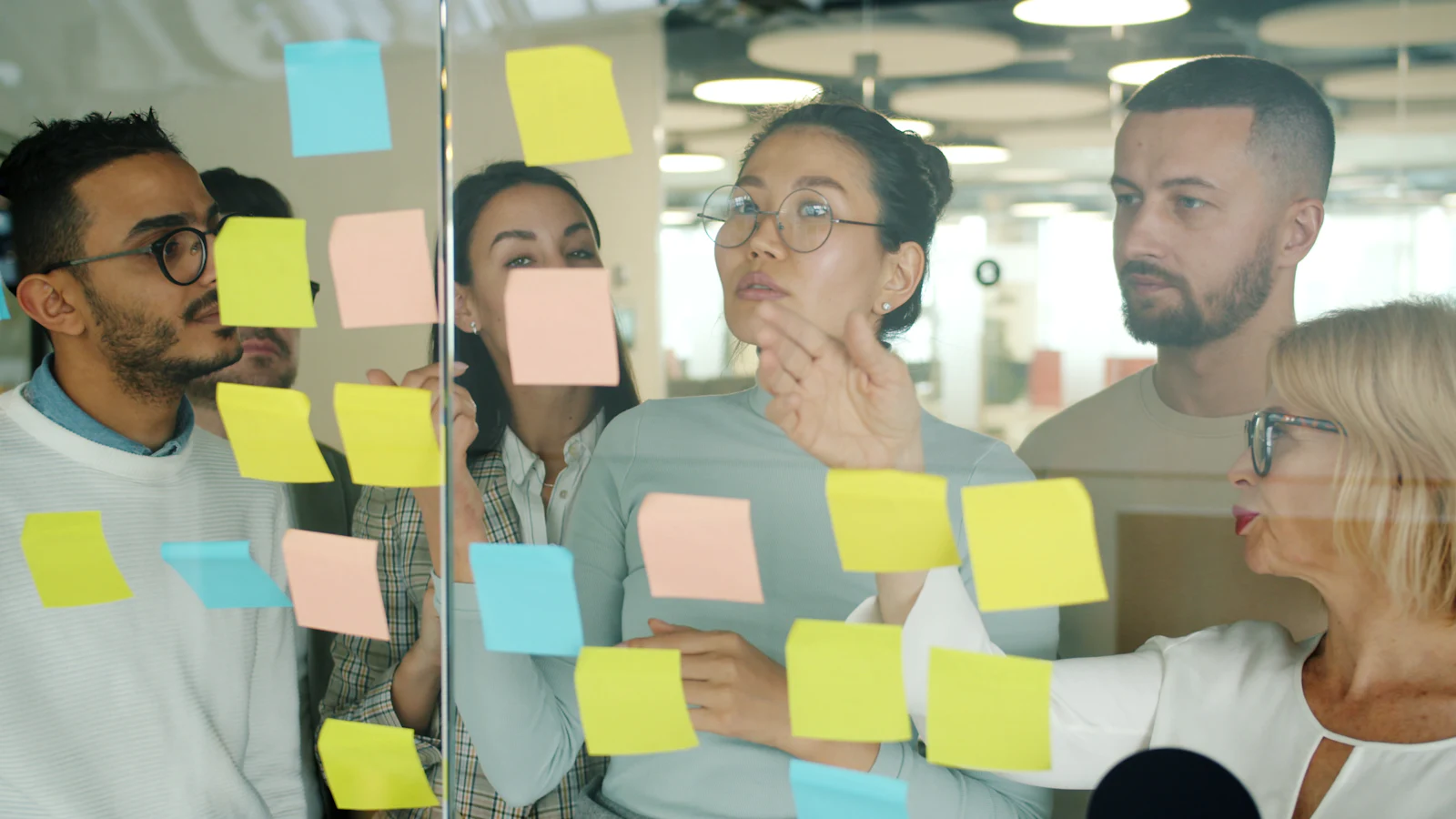 Brainstorming a marketing plan with sticky notes