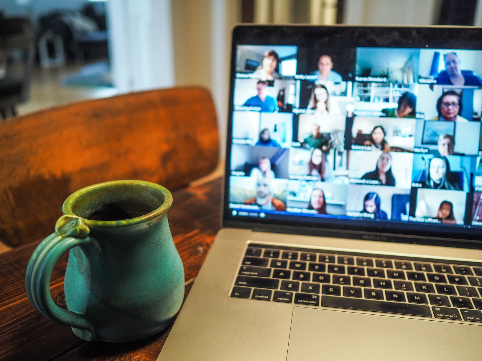 Video meeting with a remote team on a laptop